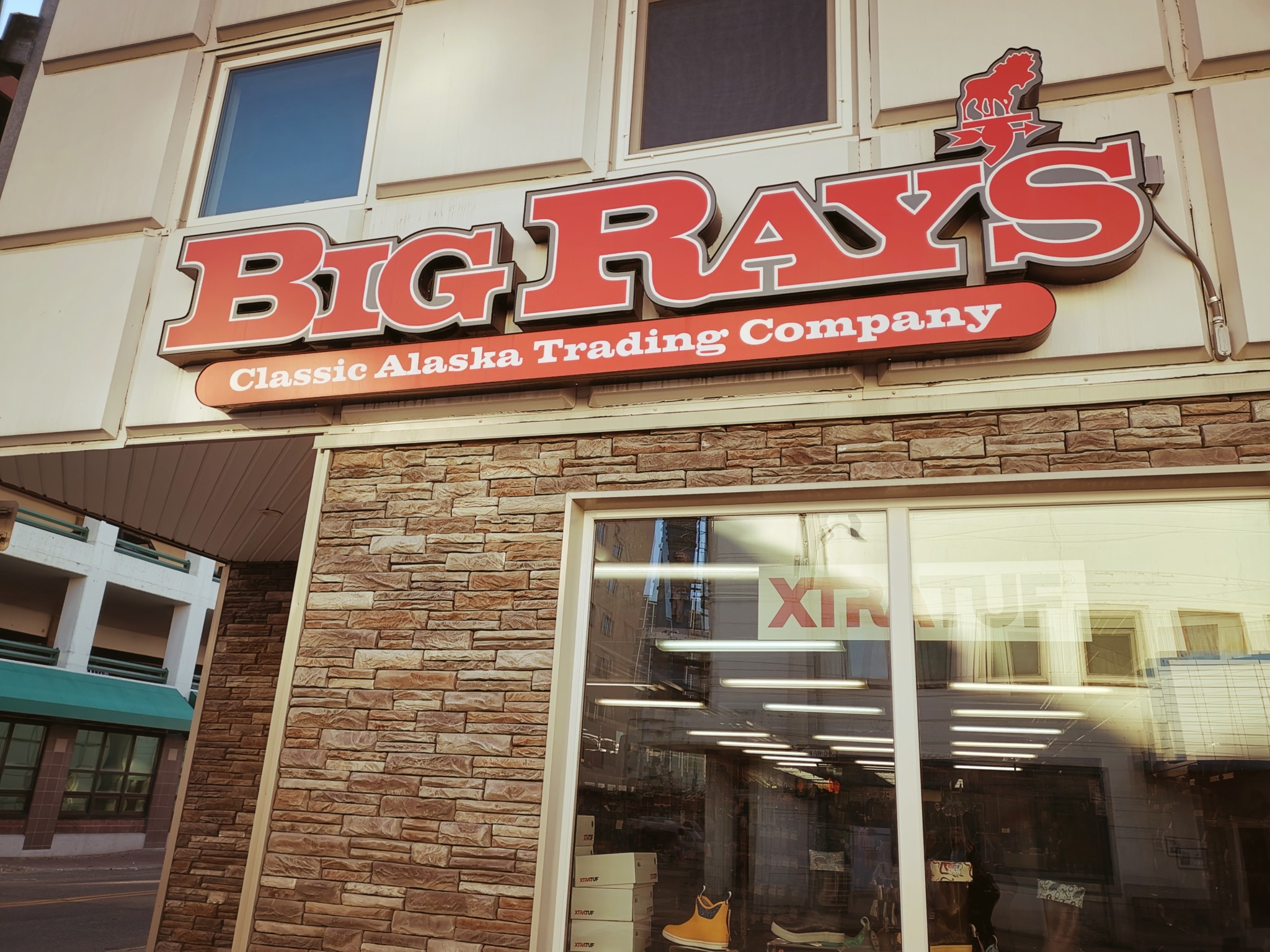 Store Front Sign that Says "Big Ray's"