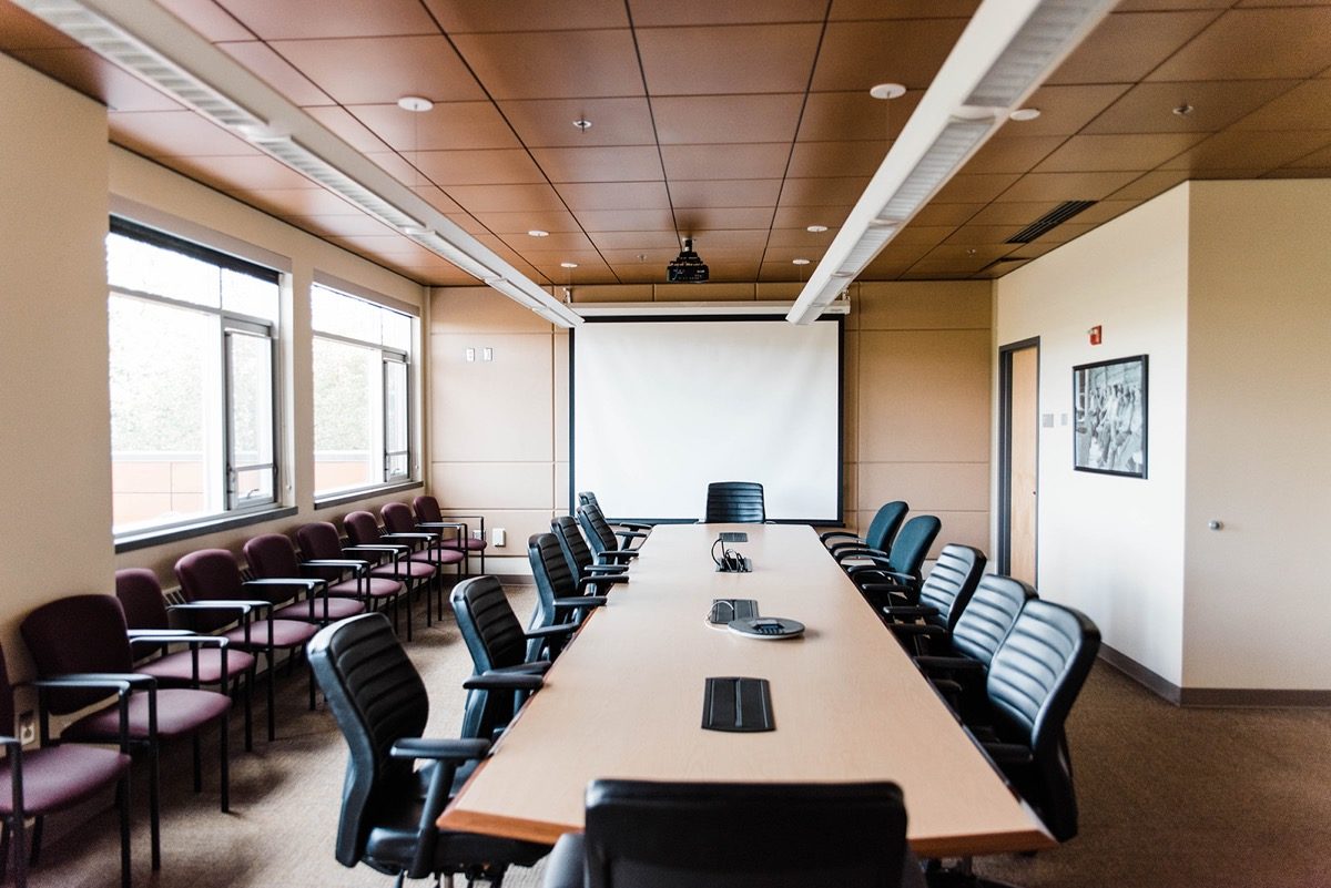 Conference room with board table and chairs