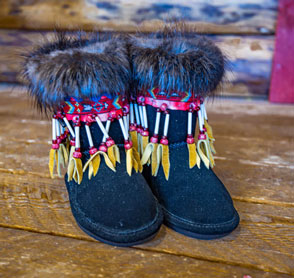 native boots with fur and beadwork